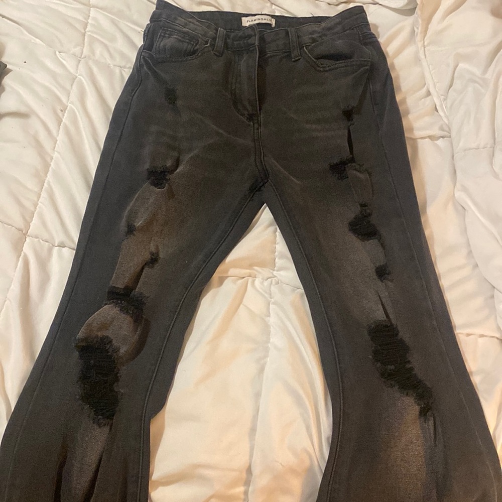 Ripped black flare jeans